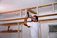 Cordless drill handy when framing the wall and double doorways.